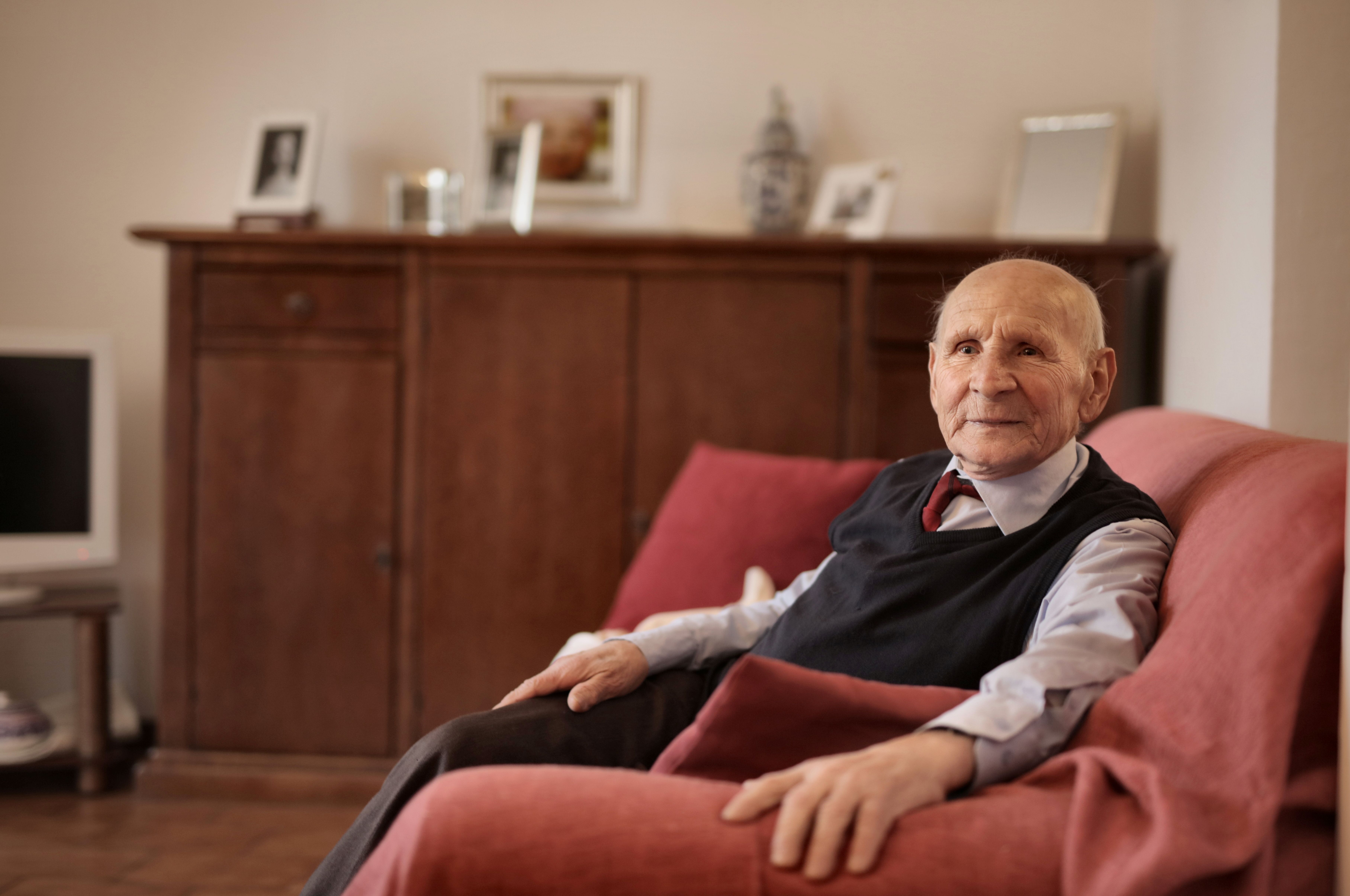 Elderly person relaxed and comfortable at home